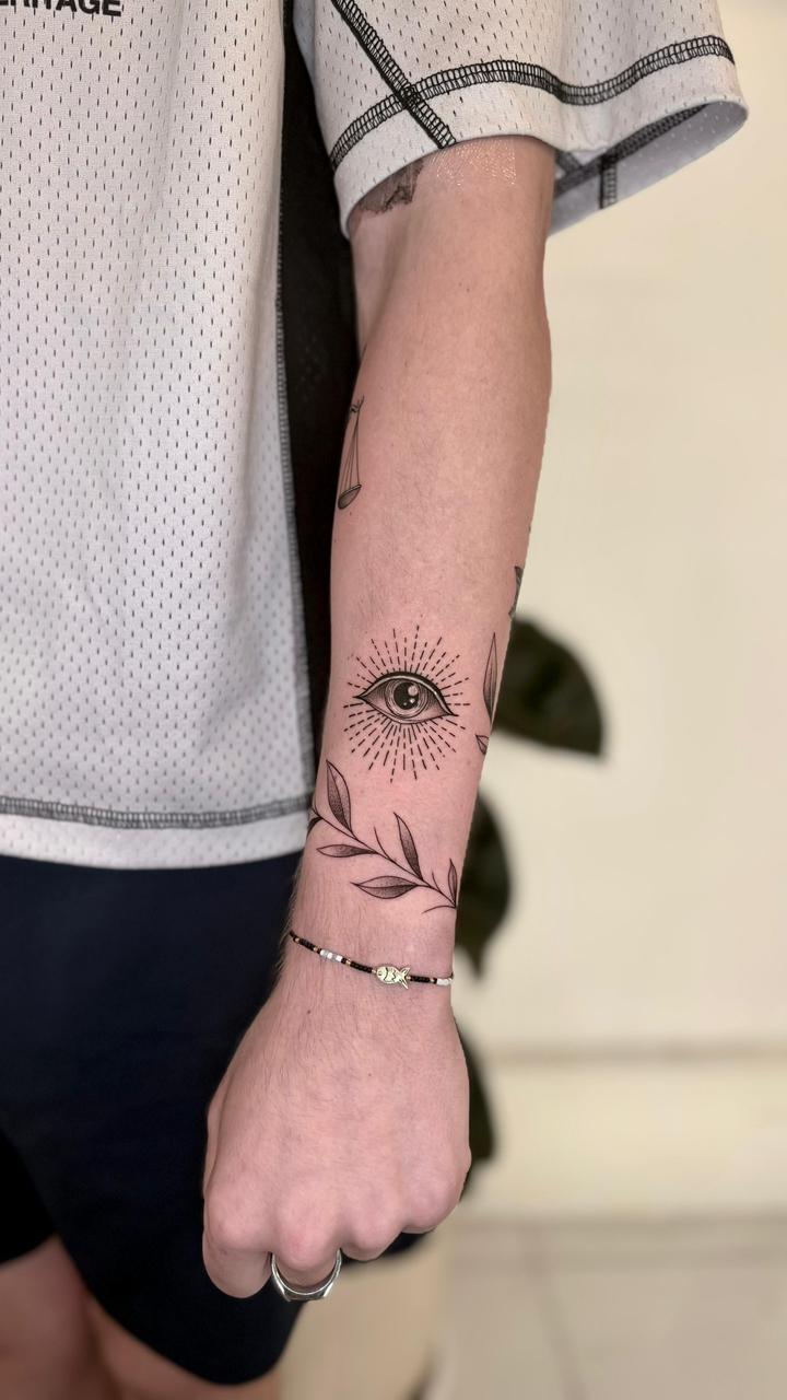 Subtle inner arm dolphin tattoo - Tropical Ink Bali